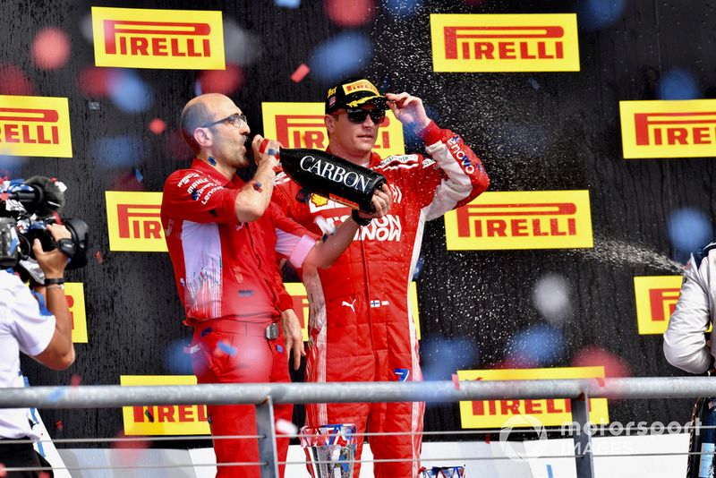 Carlo Santi al lado de Kimi Räikkönen